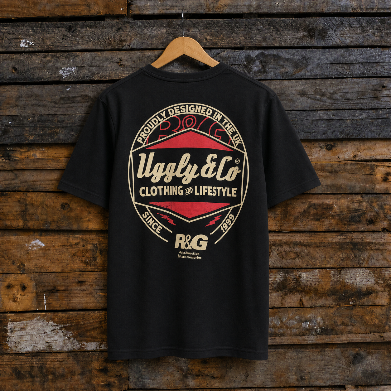 Black t-shirt with a red and white logo on a wooden background