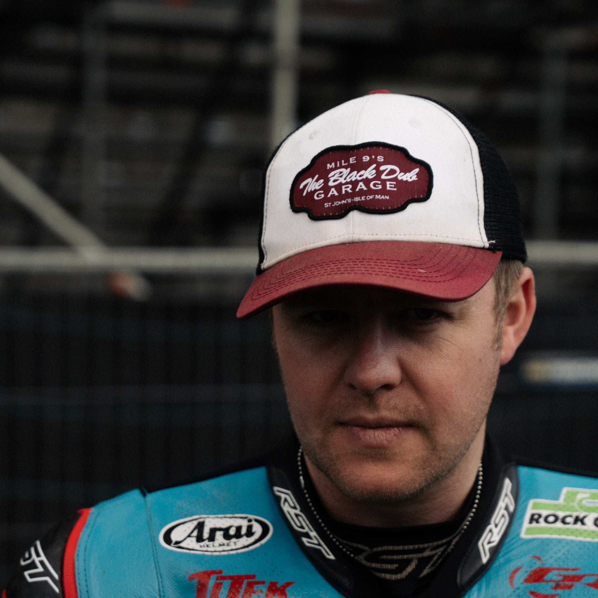 Dan Ingham in black dub hat by race stands