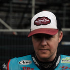 Dan Ingham in black dub hat by race stands