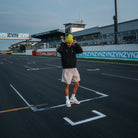 Kyle Ryde at donnington park wearing yellow uggly and co beanie