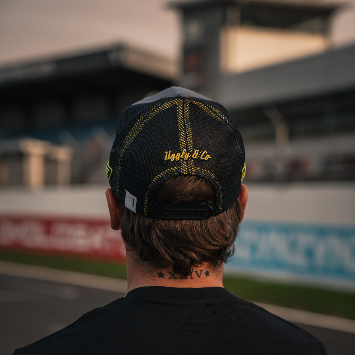 detail photo showing mesh and rear closing on black and white trucker hat