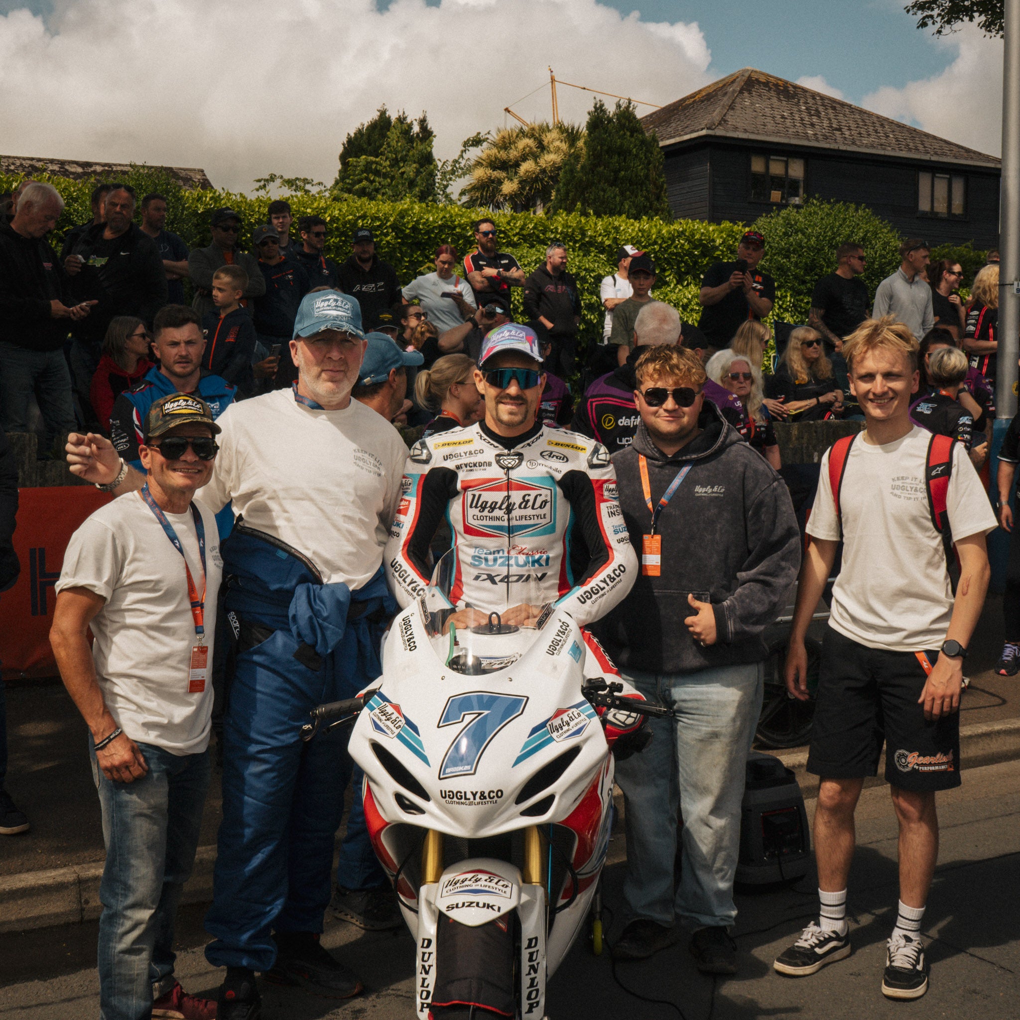 uggly and co racing team with josh brookes on iom tt grid
