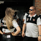 Trackside photo of the Bimota FS-3 BSB Polo Shirt worn by the team.