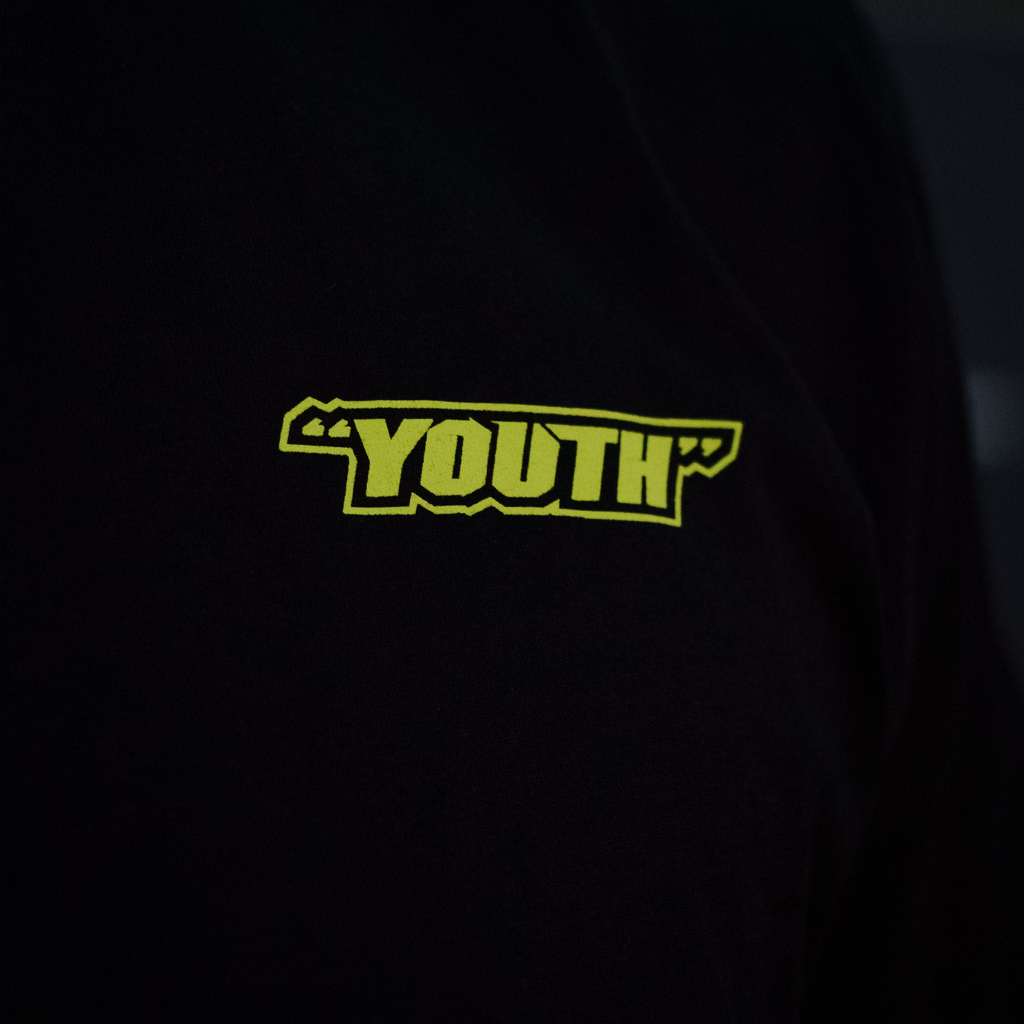 Black Kyle Ryde Graphic T-Shirt youth logo close up