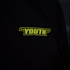 Black Kyle Ryde Graphic T-Shirt youth logo close up