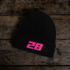 black and pink beanie with race inspired numbers, brad ray signature