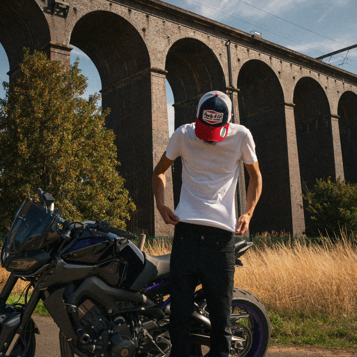 Biker model wearing the Blue and Red Diamond Hat