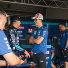 brad ray with mechanics in the pit lane of bsb race
