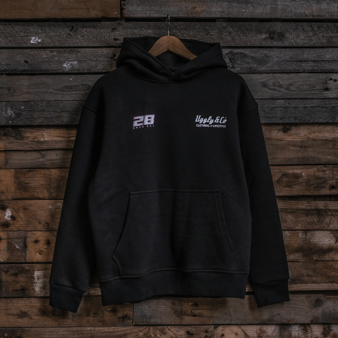 Black hoodie with logos on a wooden background