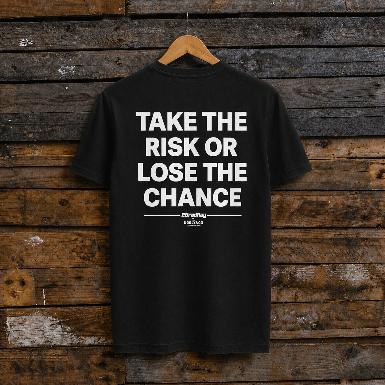 ack view of the black Bradley Ray tee with Take The Risk Or Lose The Chance print