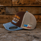 brown and blue race inspired cap taken from the side 
