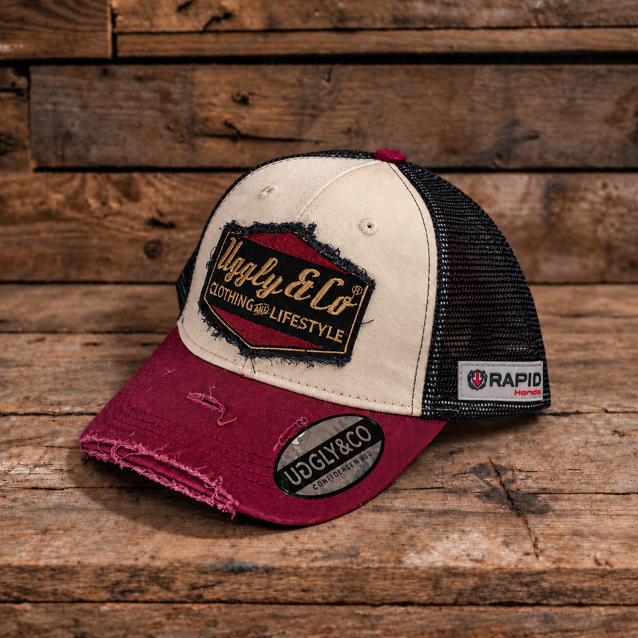 Burgundy, beige and gold Diamond trucker cap by Uggly & Co, front view with rapid Honda badge