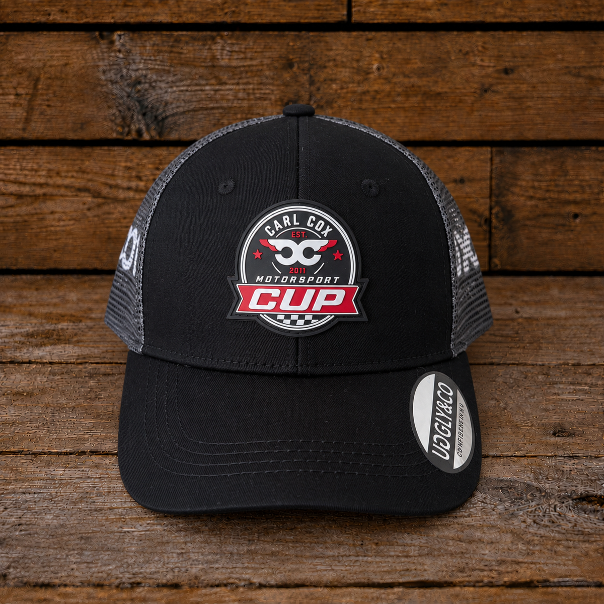 Carl Cox Motorsport Cup Cap shown from the front with embroidered motorsport branding.