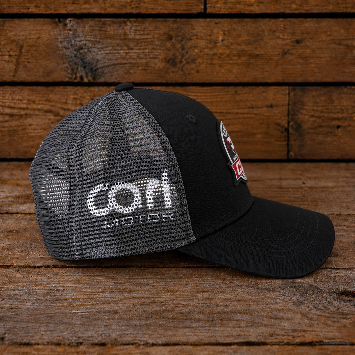 Side view of the Carl Cox Motorsport Cup Cap showing branded side detailing.