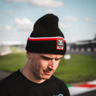 Front view of the Carl Cox North West 200 Beanie by Uggly & Co, featuring motorcycle racing inspired branding celebrating the iconic North West 200 road races.