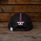 Back view of the Carl Cox Trucker Hat x Simon Reid featuring black mesh, snapback closure and embroidered rear detailing.