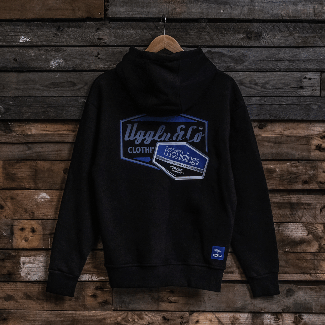 Black hoodie with blue logo on a wooden background