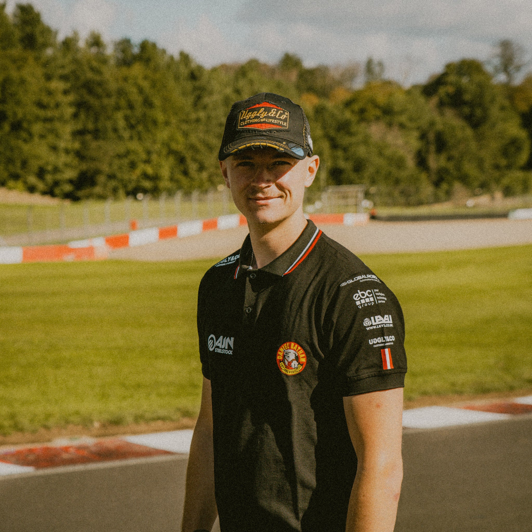 Front view of the Diamond Trucker Hat x Bathams Racing worn by storm stacey