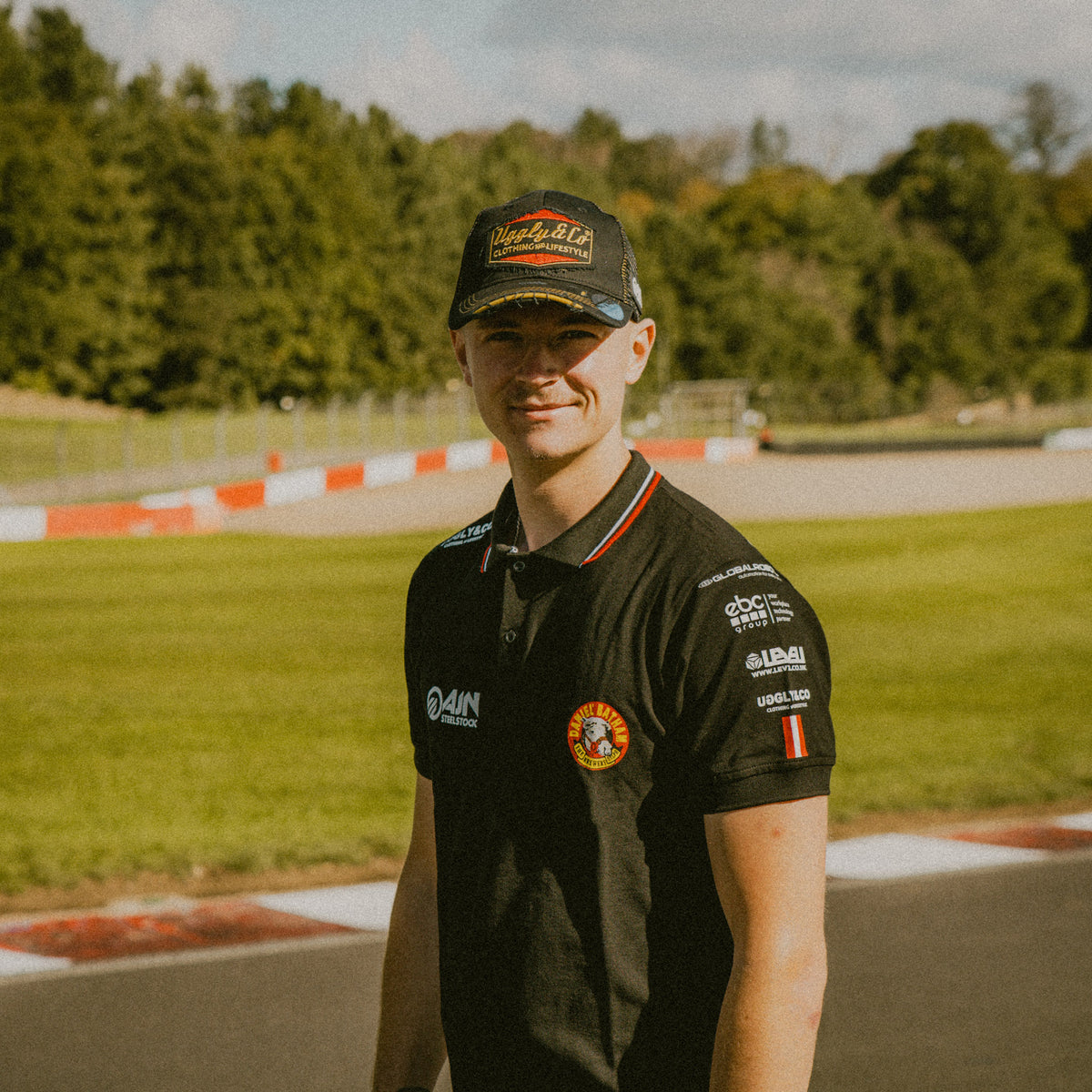 Front view of the Diamond Trucker Hat x Bathams Racing worn by storm stacey