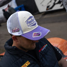Mitch Rees wearing the Uggly&Co Diamond Trucker Hat at a motorcycle racing event