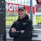 Close up of Fenton Seabright at race track
