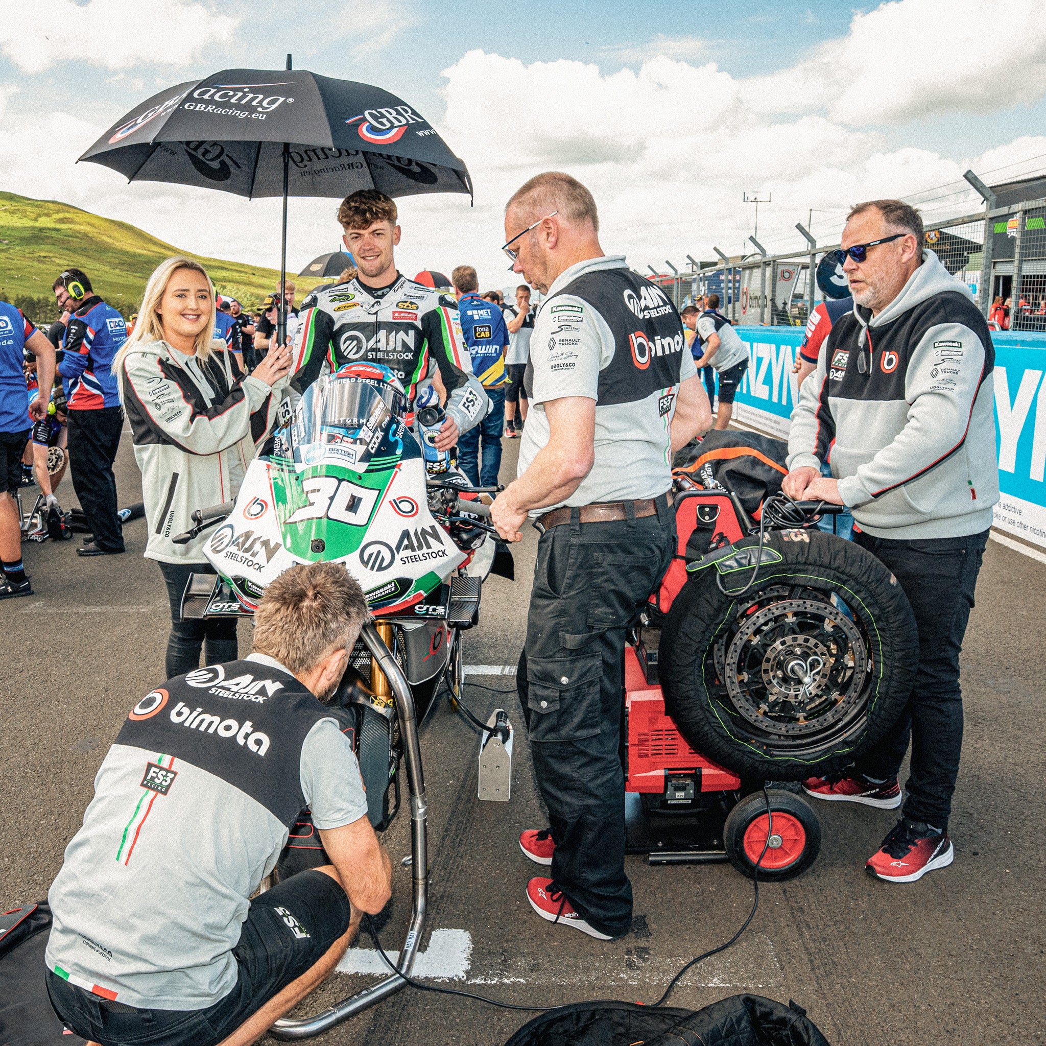 Max Cook on bsb grid, FS3 Racing Bimota motorsport hoodie with race team inspired graphics and grey hood