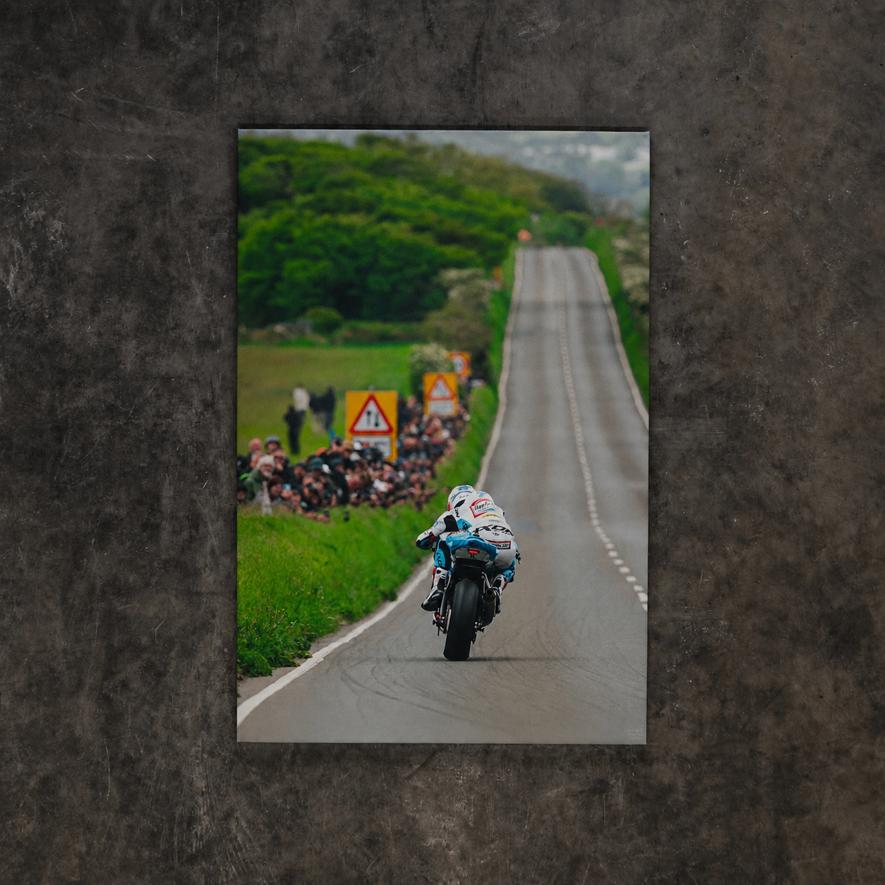 Josh Brookes riding the Uggly & Co TT bike at Creg Ny Baa during the Isle of Man TT, shown as canvas wall art.
