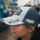 Close-up of Katie Hand wearing the Uggly&Co Off White and Navy Diamond Cap