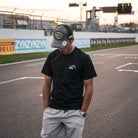 Kyle Ryde at doninton park wearing black uggly and co t shirt