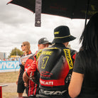 Kyle Ryde on the race grid wearing the black and neon yellow Uggly&Co Diamond Bucket Hat.