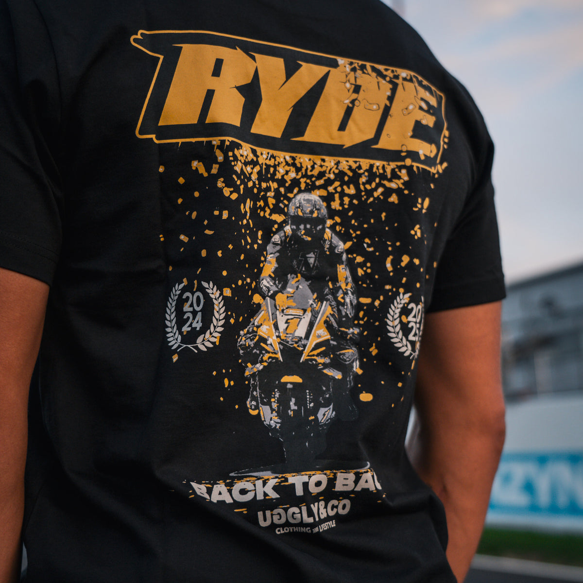 Championship graphic detail on Kyle Ryde Back-to-Back Confetti Tee