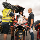 Kyle Ryde on the BSB starting grid wearing the Diamond Bucket Hat with black and neon yellow details.