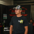 Kyle Ryde wearing the Uggly&Co Diamond T-shirt at a race event