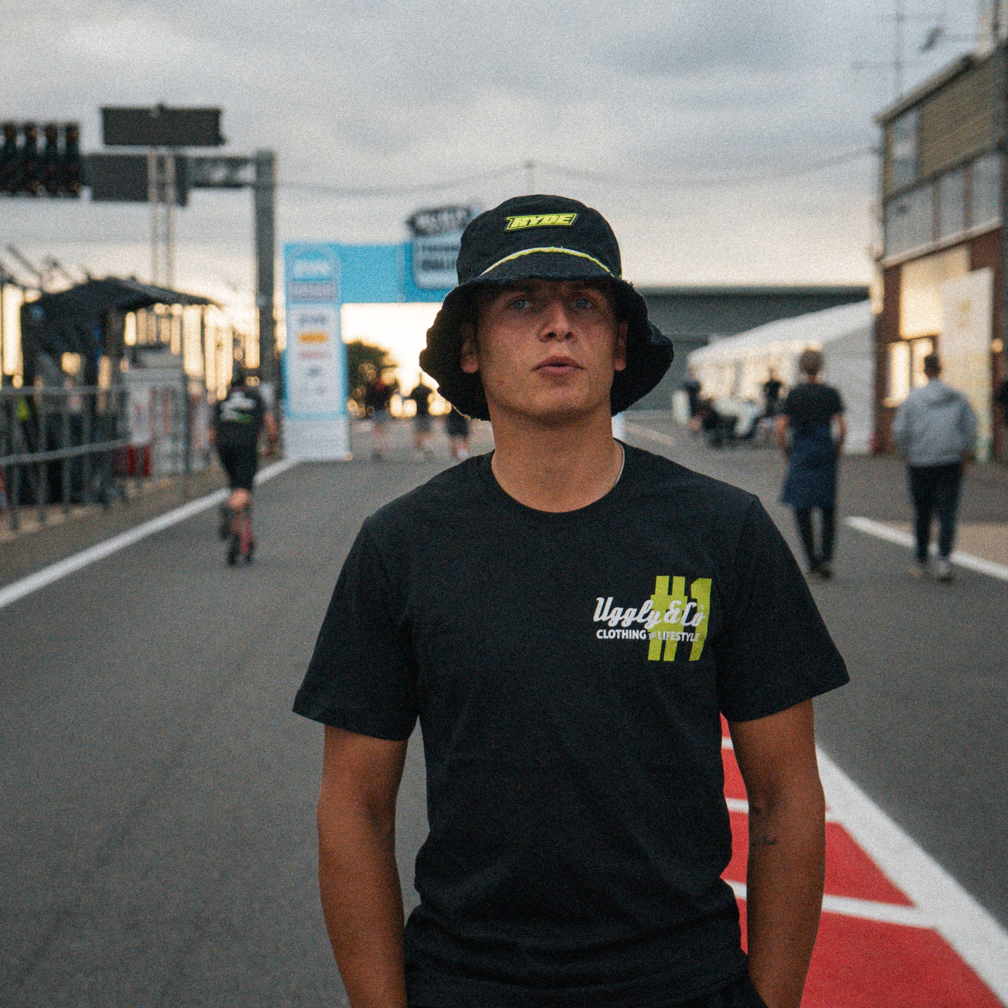 Trackside photo of Kyle Ryde wearing a Kyle Ryde #1 black t-shirt from Uggly&Co