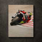 Kyle Ryde leaned over through a wet corner during a British Superbike race, shown as canvas wall art.