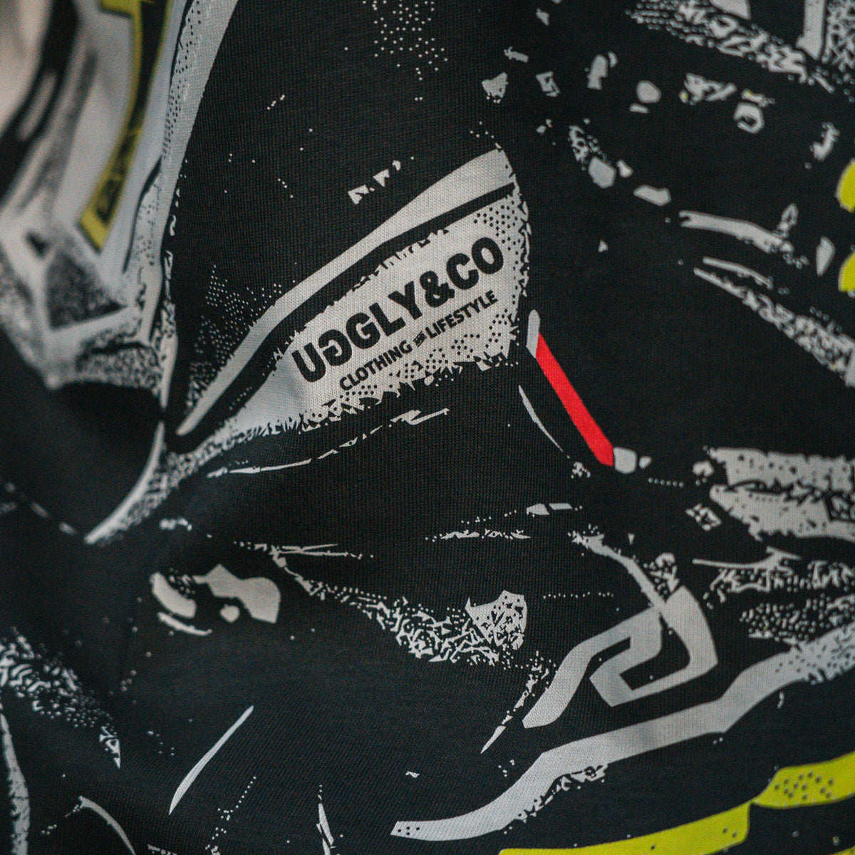 Close-up of the graphic print on the white Kyle Ryde T-Shirt from Uggly & Co's British Superbikes motorcycle clothing collection.
