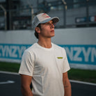 Model wearing the Kyle Ryde White Graphic T-Shirt by Uggly & Co, combining British Superbike racing heritage with casual motorcycle streetwear.