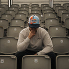 Marcus simpson at race event in gulf color clothing
