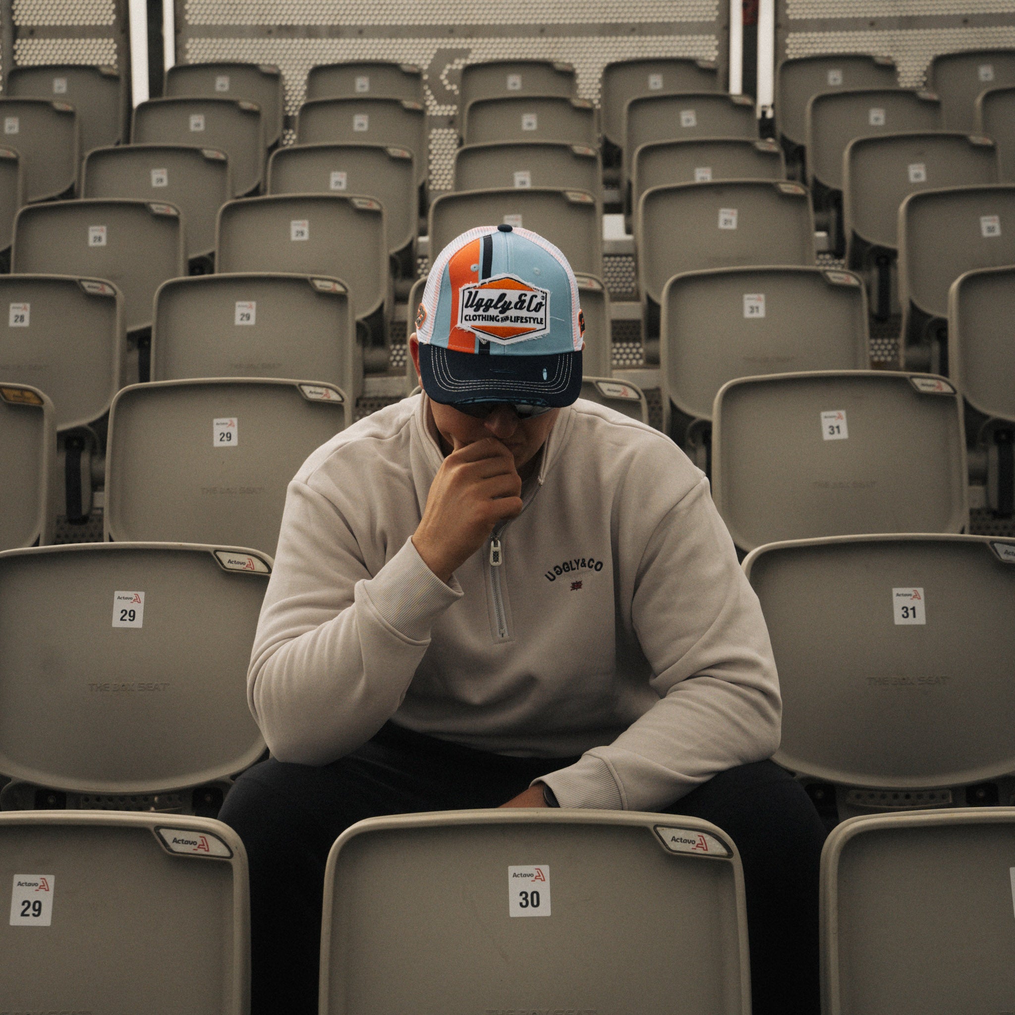 Marcus simpson at race event in gulf color clothing