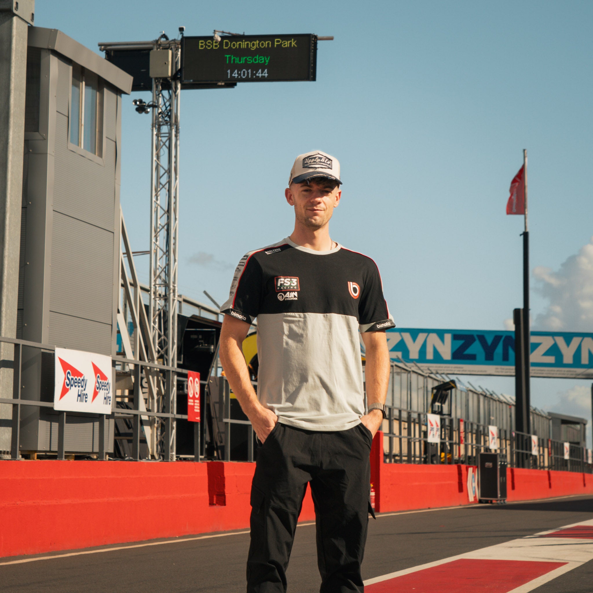 max cook in the pit lane wearing biota fs-3 t-shirt