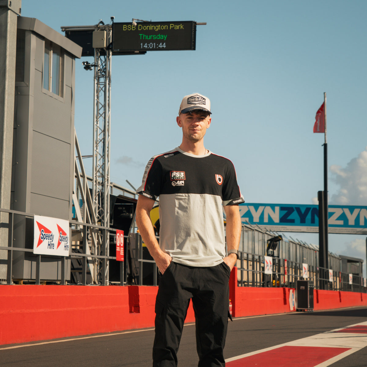 max cook in the pit lane wearing biota fs-3 t-shirt
