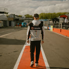 Max cook waring his bimota hoodie in the pit lane at donnington park