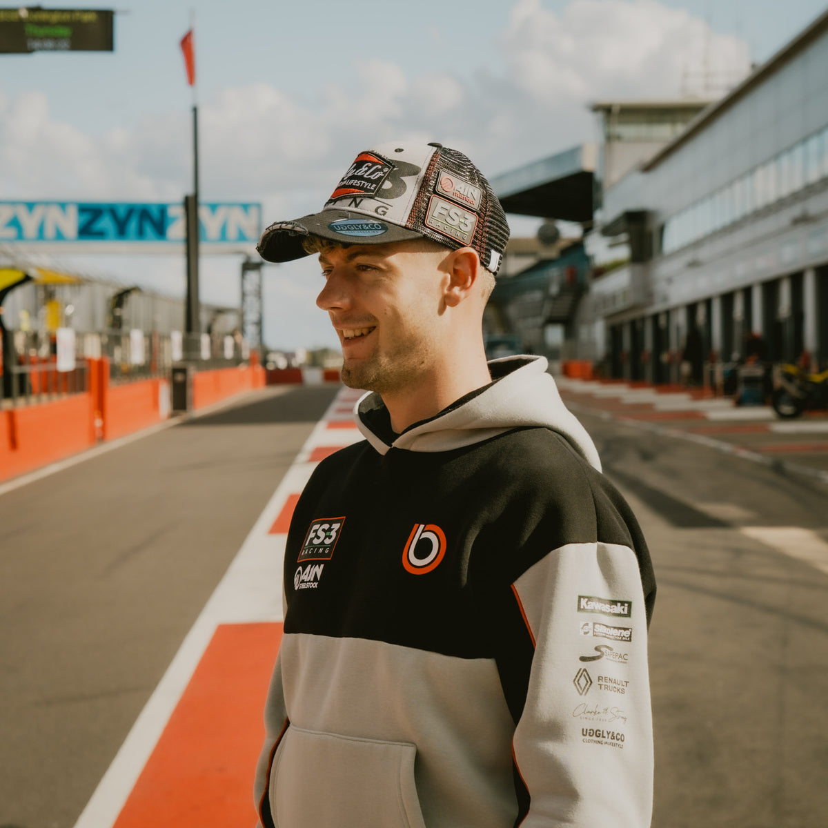 Max Cook wearing the FS-3 Superbike Racing Trucker Hat in the British Superbike pit lane