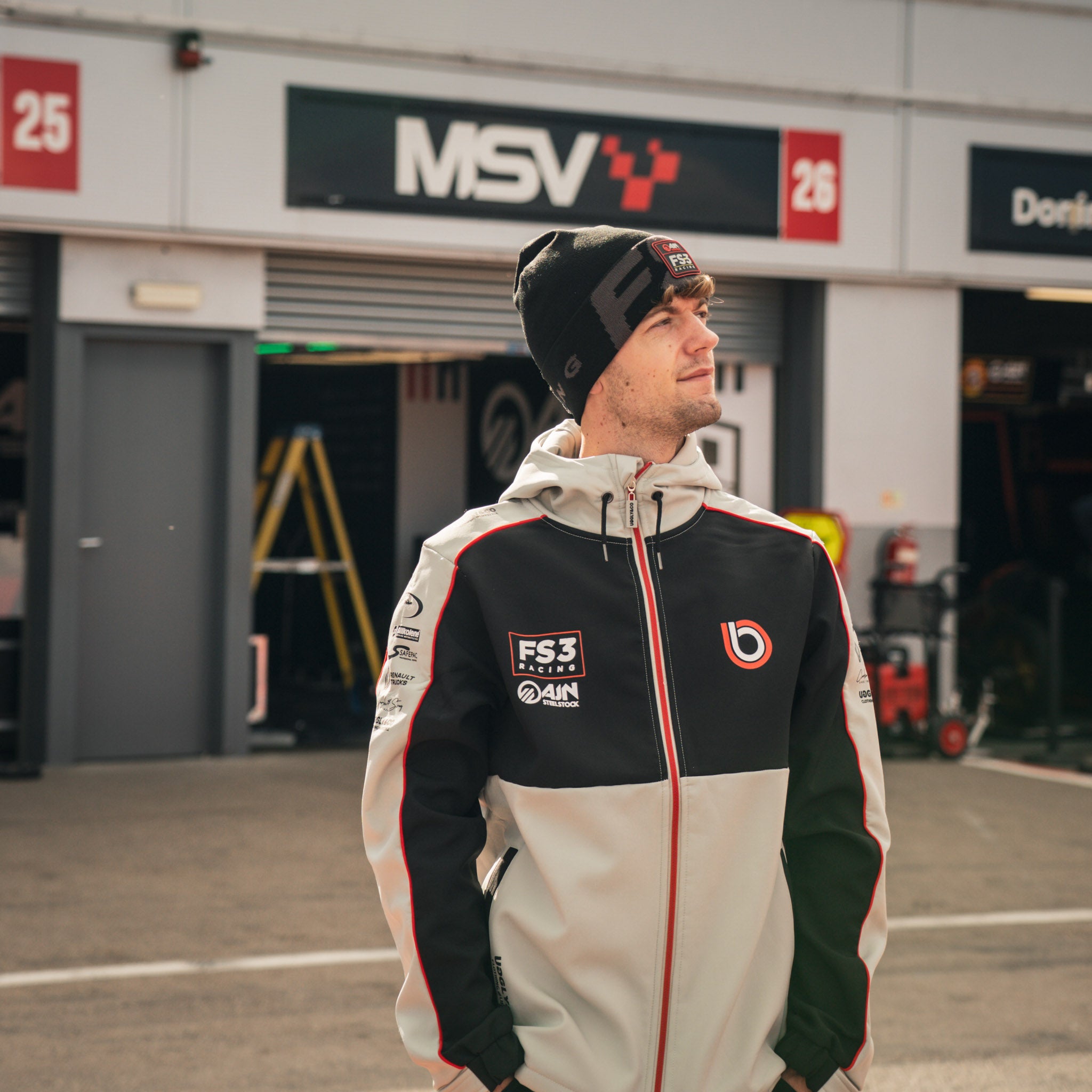 max cook in the pit lane at donnington park wearing his bimota jacket