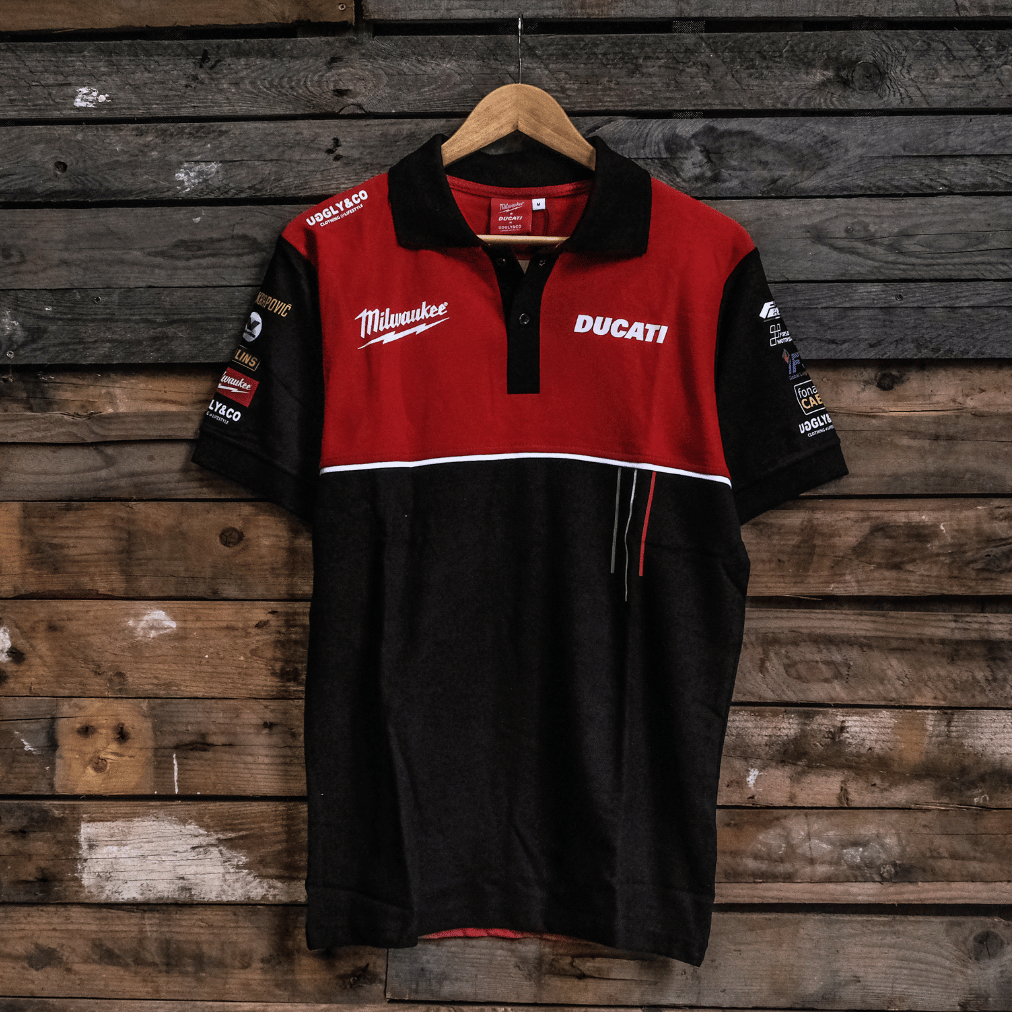 Red and black shirt with Ducati and Milwaukee logos on a wooden background