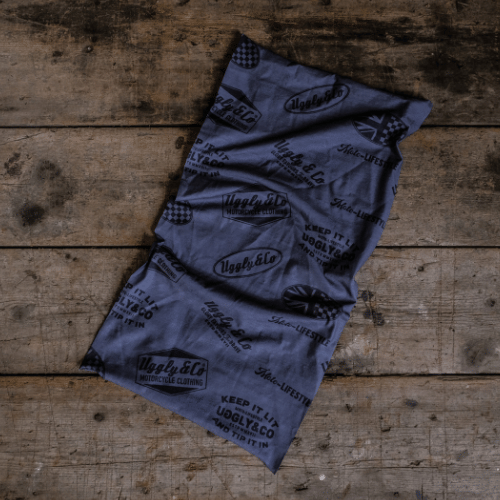 Gray fabric with branding on a wooden surface