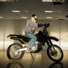 Navy Blue & White Diamond Trucker Hat worn by Abby Marshall on a Suzuki drz