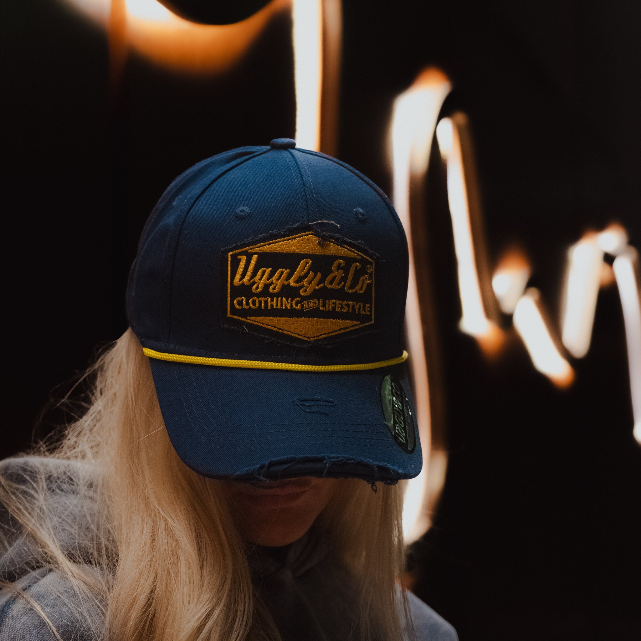 Navy Blue & Yellow Rope Diamond Baseball Cap in a lifestyle setting