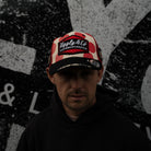 Pierre Yves Bian in retro red and white polka dot hat 