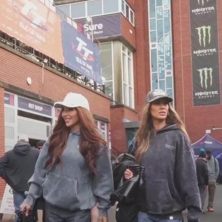 video showing two female models wearing vintage acid wash hoodies